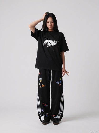 DAXUEN Abstract graphic paint splash short-sleeved T-shirt — model photo