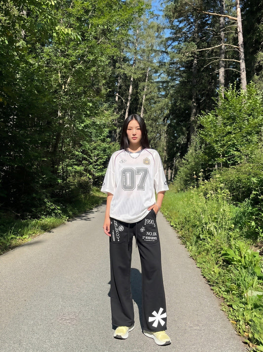 DAXUEN light grey marl wide-leg abstract graphic pants — model photo