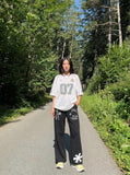 DAXUEN light grey marl wide-leg abstract graphic pants — model photo
