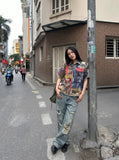 DAXUEN multi-color abstract graphic reversible button-up shirt — model photo