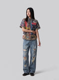 DAXUEN multi-color abstract graphic reversible button-up shirt — model photo