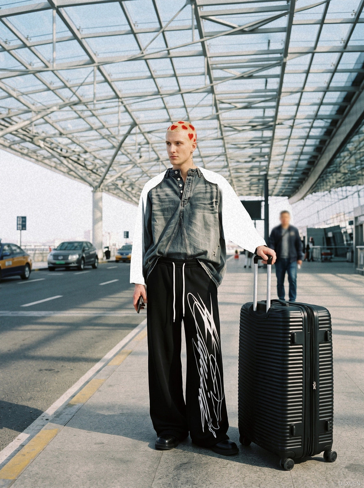 DAXUEN black wide-leg abstract graphic sweatpants — model photo