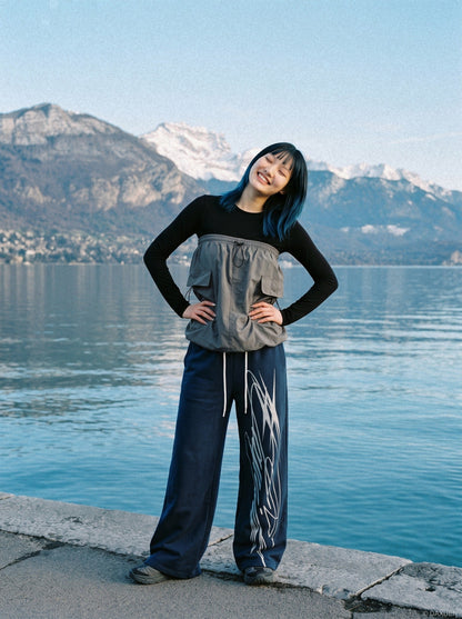 DAXUEN black wide-leg abstract graphic sweatpants — model photo