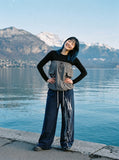 DAXUEN black wide-leg abstract graphic sweatpants — model photo