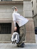 DAXUEN white oversized abstract mushroom graphic T-shirt — model photo