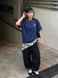 DAXUEN white oversized abstract mushroom graphic T-shirt — model photo