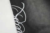 DAXUEN washed black wide-leg abstract-script sweatpants