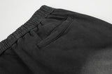 DAXUEN washed black wide-leg abstract-script sweatpants