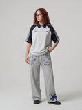 DAXUEN grey melange abstract star graphic wide-leg pants — model photo