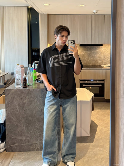 DAXUEN Oversized short-sleeved button-up shirt with graphic — model photo