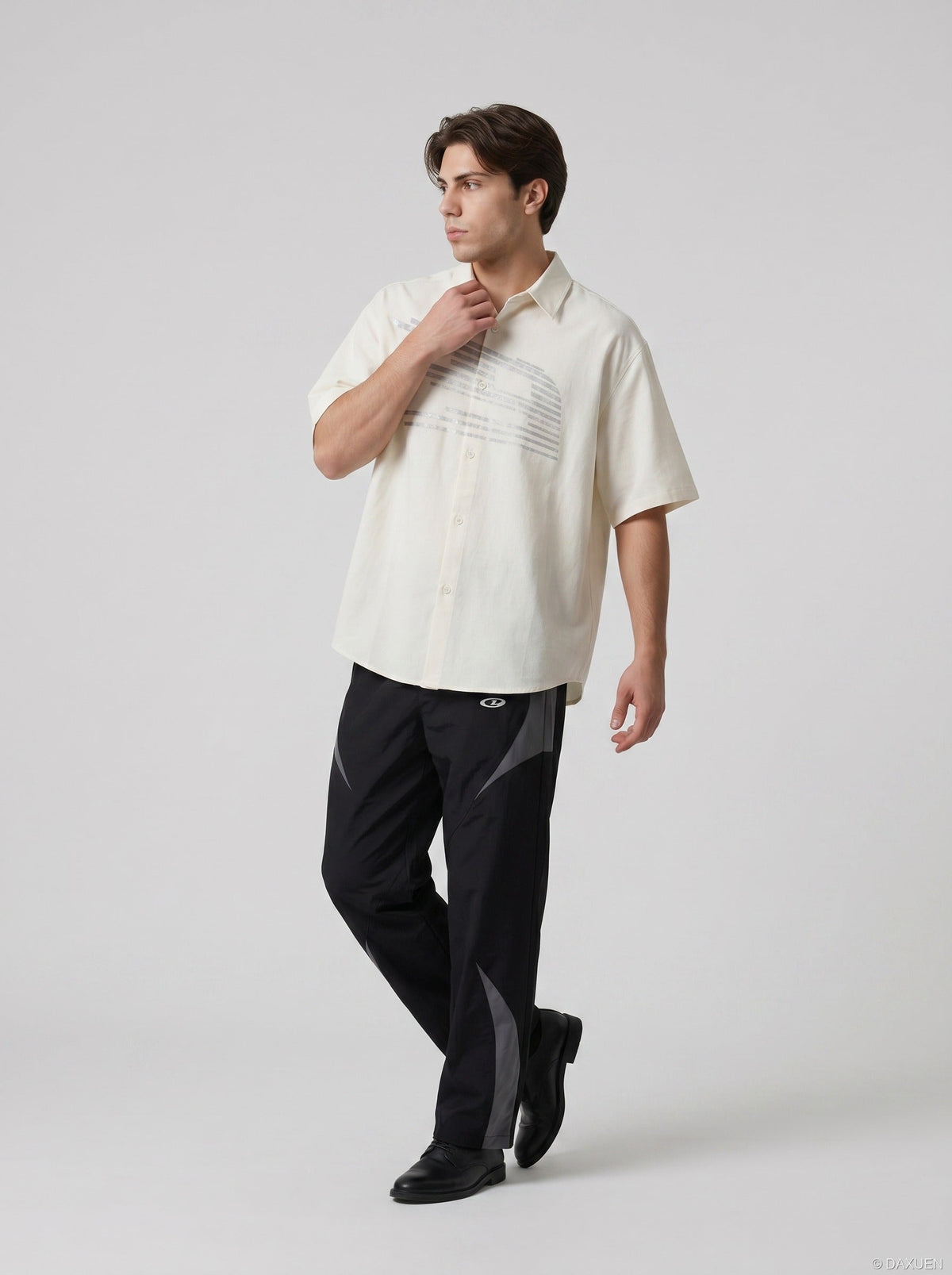 DAXUEN Oversized short-sleeved button-up shirt with graphic — model photo