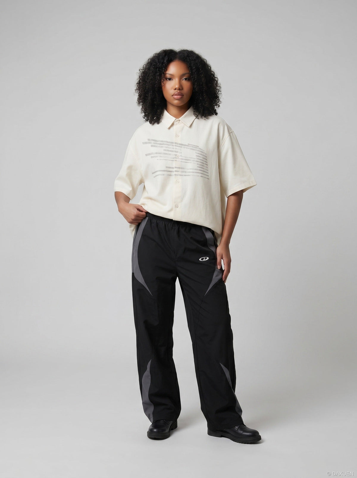 DAXUEN Oversized short-sleeved button-up shirt with graphic — model photo
