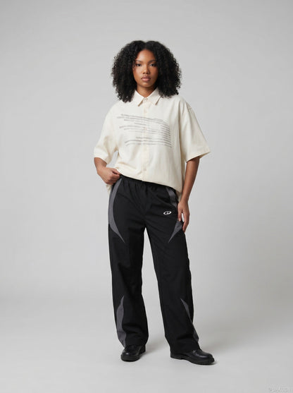 DAXUEN Oversized short-sleeved button-up shirt with graphic — model photo