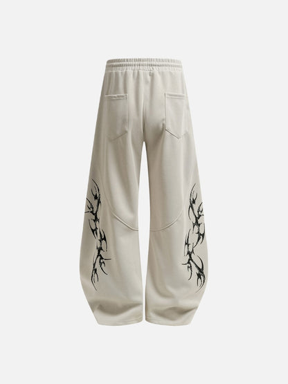 DAXUEN beige oversized abstract tribal graphic sweatpants