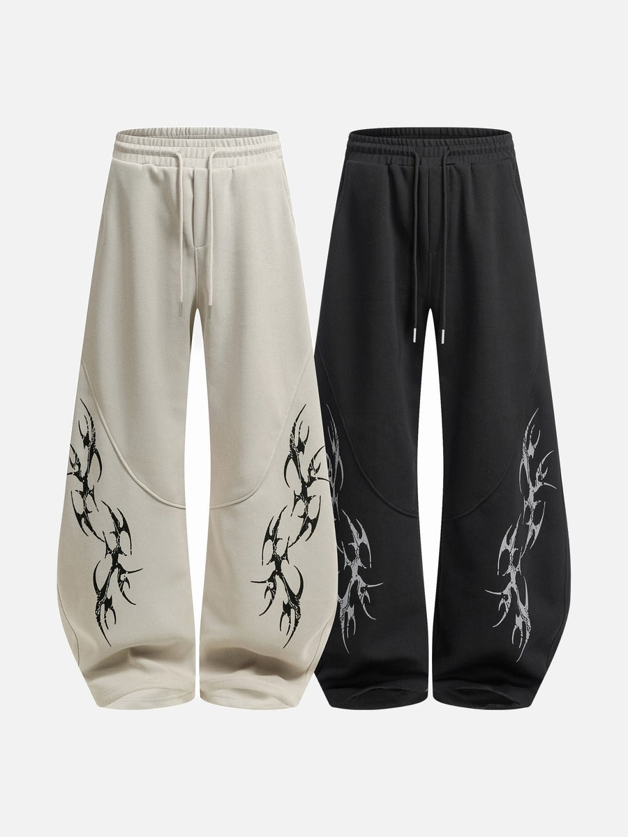 DAXUEN beige oversized abstract tribal graphic sweatpants