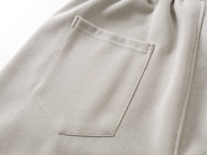 DAXUEN beige oversized abstract tribal graphic sweatpants