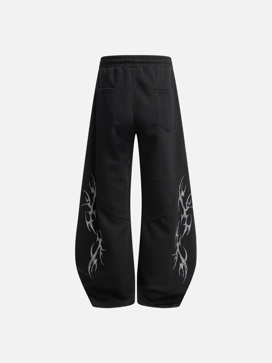 DAXUEN beige oversized abstract tribal graphic sweatpants