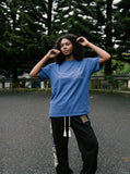 DAXUEN blue abstract wavy lines graphic t-shirt — model photo