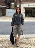 DAXUEN Wide-leg cargo shorts in faded grey-blue denim — model photo