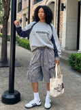 DAXUEN Wide-leg cargo shorts in faded grey-blue denim — model photo