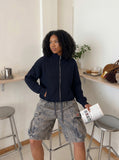 DAXUEN Wide-leg cargo shorts in faded grey-blue denim — model photo