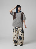 DAXUEN Oversized acid wash short-sleeved T-shirt — model photo