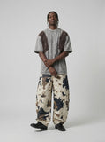DAXUEN Oversized acid wash short-sleeved T-shirt — model photo