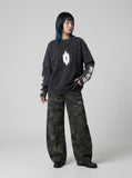 DAXUEN Acid wash long sleeve t-shirt with graphic design — model photo
