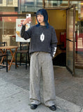 DAXUEN Acid wash long sleeve t-shirt with graphic design — model photo