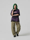 DAXUEN Oversized acid wash t-shirt with graphic design — model photo
