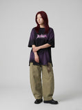 DAXUEN Oversized acid wash t-shirt with graphic design — model photo