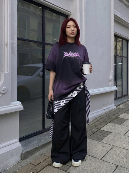 DAXUEN Oversized acid wash t-shirt with graphic design — model photo