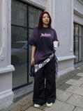 DAXUEN Oversized acid wash t-shirt with graphic design — model photo