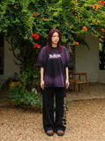 DAXUEN Oversized acid wash t-shirt with graphic design — model photo