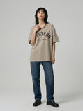 DAXUEN Loose-fitting short-sleeved V-neck T-shirt with graphic — model photo