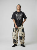 Inhumane graphic oversized black t-shirt — model photo