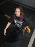 Inhumane graphic oversized black t-shirt — model photo