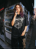 Inhumane graphic oversized black t-shirt — model photo