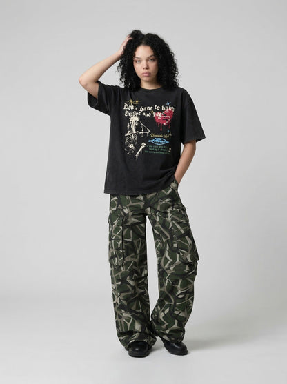 Grungy graphic t-shirt with skull and text — model photo