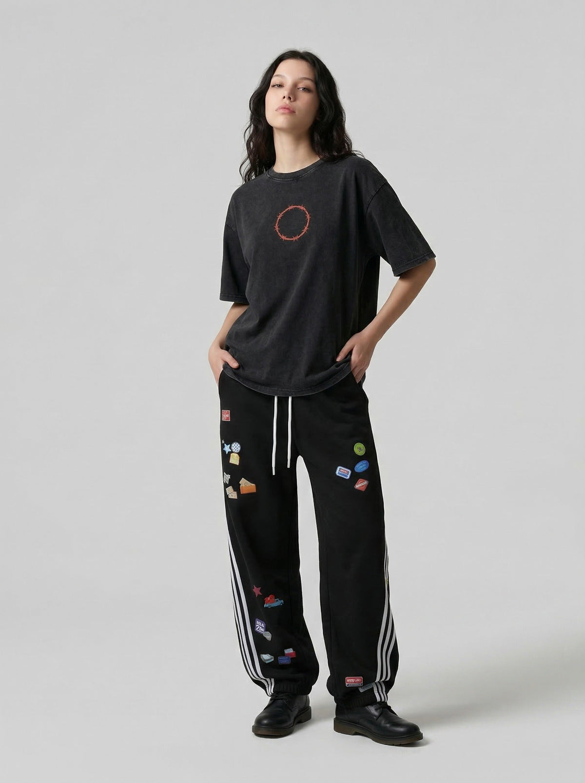 Washed black loose-fit graphic T-shirt — model photo