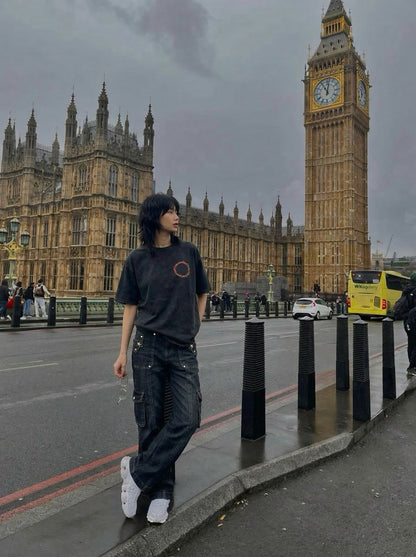 Washed black loose-fit graphic T-shirt — model photo
