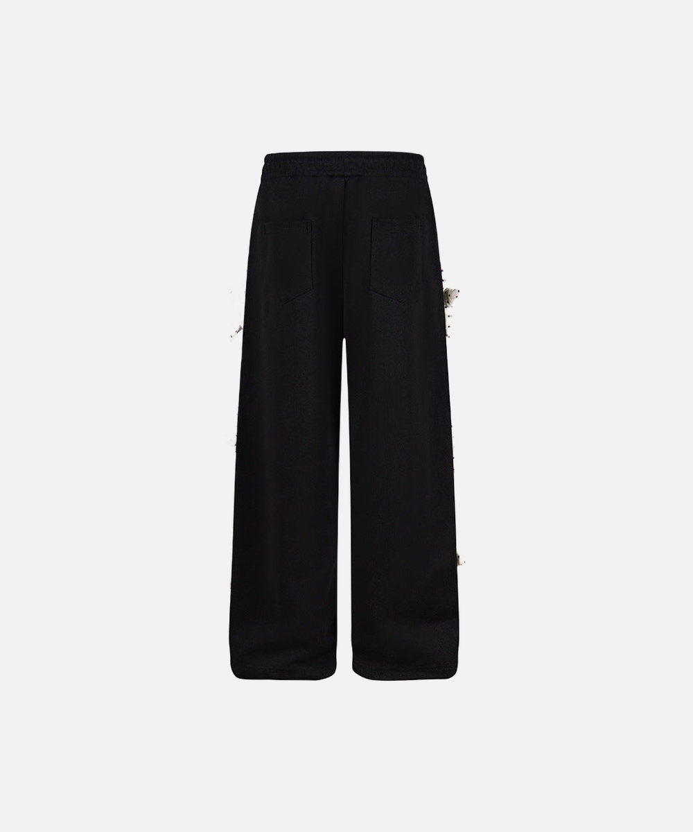 DAXUEN Wide-leg sweatpants with star decorations