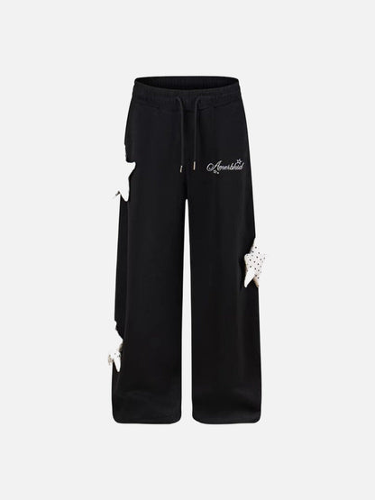 DAXUEN Wide-leg sweatpants with star decorations
