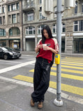 DAXUEN black angular crocodile-panel trousers — model photo