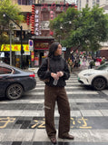 DAXUEN dark brown and black animal print flap cargo pants — model photo
