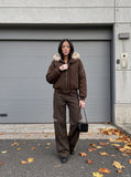 DAXUEN dark brown and black animal print flap cargo pants — model photo
