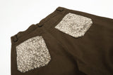 DAXUEN dark brown and black animal print flap cargo pants