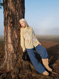 DAXUEN light yellow plaid button-up shirt with anime graphics — model photo