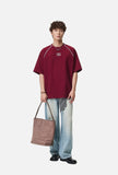 Stylized Oval Graphic Tee