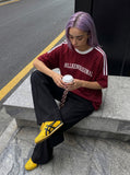 DAXUEN solid navy blue oversized arched text graphic t-shirt — model photo